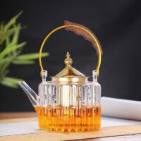 قوری پیرکس دسته چوبی و استیل طلایی 1000 میل