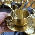 فنجان نعلبکی و قاشق استیل طلایی
